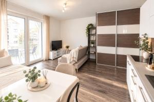 ALURE RESIDENCES 14 & 24h self check-in, private parking in front of the apartment building included, new building, CITY CENTER
