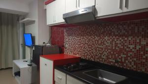 1br APARTMENT THE JARRDIN BY ZORA HOMESTAY