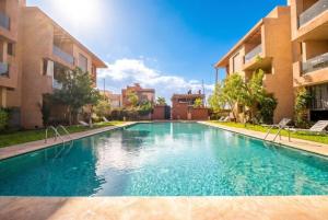 Chic Retreat on Mohammed VI Ave Pools & Terrace