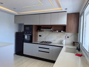 Appartement S2 Moderne avec Balcon Proche Plage