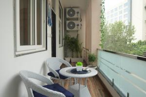 Indigo Bloom by Sabr Spacious 2bhk with Projector
