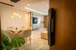 Spacious 120m High-Standing 3-Bedroom Apartment with Large Terrace and two bathrooms and fully equiped kitchen, located near the TGV station and beachside