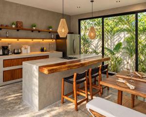Elegant boho Tulum villa 3 pools and jacuzzi