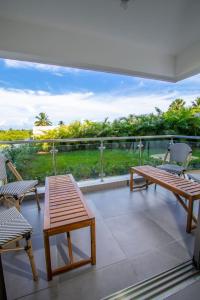 Stylish New 2-Bedroom Apartment with Pools & Gym