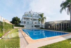 Oliva Nova Apartamento con Piscina Cubierta y Parking