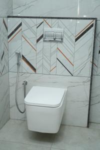 SNS SkyNest Cosy 2 BHK Stay Airport Rd