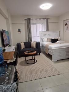 The Luxe Studio - Heated Pool, Gym & access to Garden City Mall