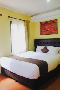 Red One Hotel Solo Baru