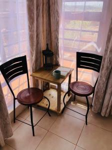 Private 2-Bedroom Cottage with Fireplace & Garden along Mangu Rd Thika