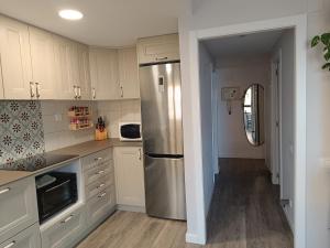 Apartamento de ensueño con piscina y vistas al mar