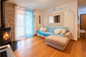 Appartamento fronte lago con terrazzo e garage a Molveno