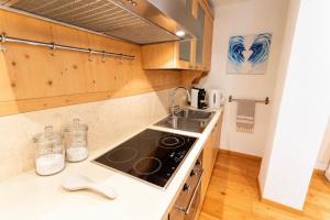 Appartamento fronte lago con terrazzo e garage a Molveno