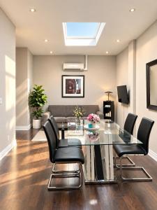 Beautiful and Cozy Apartment Steps from Lansdowne Station with Netflix