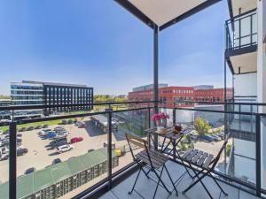 Modern Space Premium Studio with Balcony & AC by Solarento