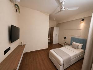 Petals Suites & Hotel - Manyata Tech Park