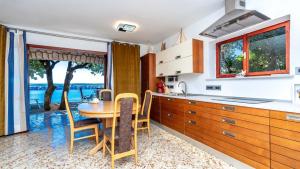 Holiday home view beachfront Jadranovo by Villas Guide