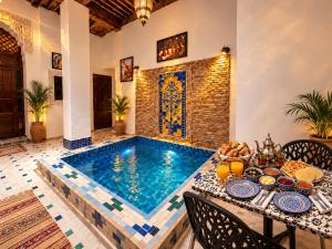 AL Magana Ryad