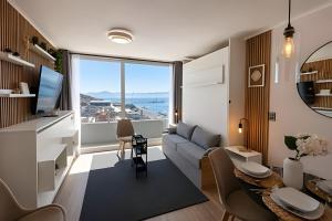 Vista al mar y gimnasio - Estudio convertible para tres personas