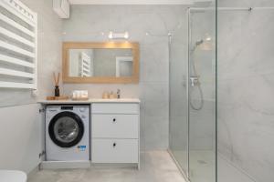 Sea&Lake Mielno Unique Apartments for a Family Holiday by the Sea with Parking by Noclegi Renters