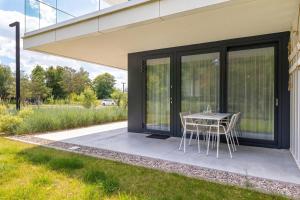 Sea&Lake Mielno Unique Apartments for a Family Holiday by the Sea with Parking by Noclegi Renters