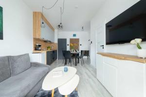 Przytulny Apartament z Prywatnym Ogrodem by Noclegi Renters