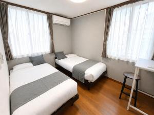 那覇空港20分 高速道路7分 イオンタウン徒歩10分 便利な貸切宿最大6名アウェイクハウス那覇