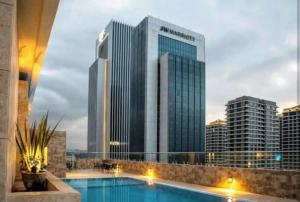 Prime Westlands 1BR with Rooftop Pool Gym and Skyline Views Opposite JW Marriott and GTC, easy access to Malls and everything you need