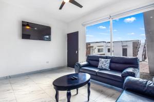 Dog-friendly retreat with ocean-view rooftop deck, pool, hot tub, & kitchen
