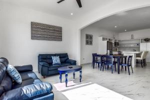 Dog-friendly retreat with ocean-view rooftop deck, pool, hot tub, & kitchen