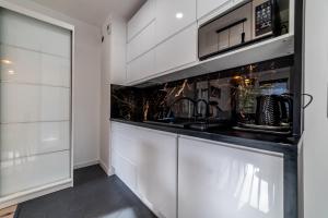 Jeżyce Modern Elegant Apartment by BookingHost