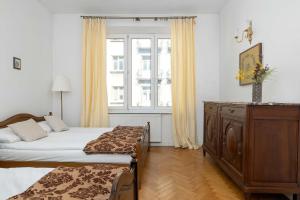 Czarujący Apartament z Sypialnią by Noclegi Renters