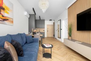 Funkcjonalne Apartamenty z Klimatyzacją i Miejscem do Pracy by Noclegi Renters