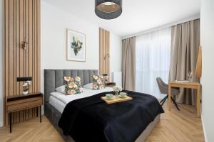 Funkcjonalne Apartamenty z Klimatyzacją i Miejscem do Pracy by Noclegi Renters