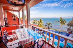 Enjoy our lovely beachfront 4 bedroom luxury villa