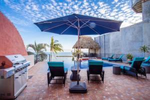 Enjoy our lovely beachfront 4 bedroom luxury villa