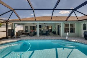 Saltwater Pool & Firepits: Cape Coral Home