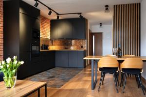 Apartament 914, 2 sypialnie, w samym centrum Wisły z widokiem na stok narciarski Skolnity