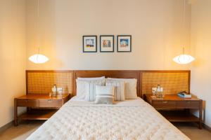 ELIVAAS Signature Casa Isla Heritage-Style 4 BHK Retreat with Private Pool, Balconies, Pillared Verandah & Landscaped Garden