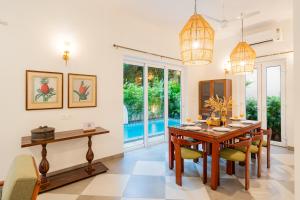 ELIVAAS Signature Casa Isla Heritage-Style 4 BHK Retreat with Private Pool, Balconies, Pillared Verandah & Landscaped Garden