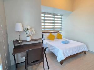 BGC Uptown Parksuites Luxury Two Bedroom Zen inspired Unit Steps to Mitsukoshi Grand Hyatt Hotel and St Lukes