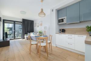 Nadmorski Apartament Sauna Jacuzzi by Noclegi Renters