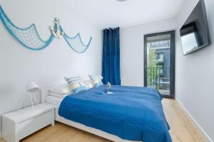Nadmorski Apartament Sauna Jacuzzi by Noclegi Renters