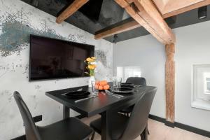 Modern Attic Apartment with Air Conditioning in the City Centre by Noclegi Renters