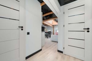Modern Attic Apartment with Air Conditioning in the City Centre by Noclegi Renters