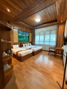 โรงแรมเฮือนก่ำจันทร์ kumchan house hotel