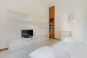 GuestHost - Comfy and Roomy apartment in Milan