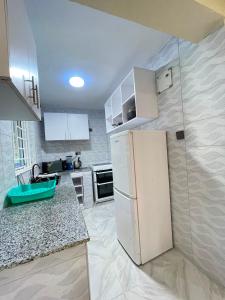 J & T Holme Apartment