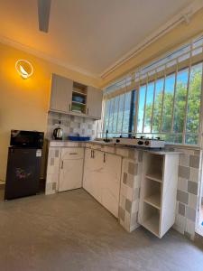 J & T Holme Apartment