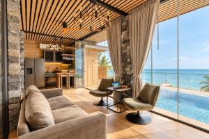 Absolute Beachfront Pool Villa with Rooftop Lounge & Sunset Views