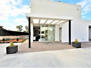 Holiday Home Moderna Villa cerca del golf y con piscina privada- ideal para familias - ofert by Interhome